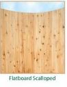 Flatboard scalloped wooden fence with a natural finish.